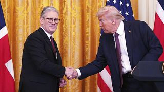 Britain's Prime Minister Keir Starmer, left, and U.S. President Donald Trump shake hands at a joint press conference in the East Room at the White House. 27 February 2025.
