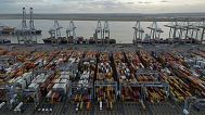Shipping containers wait to be processed at London Gateway port in Stanford-le-Hope, 5 February, 2025