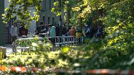 Dozens of people from all over the world line in front of the central registration centre for asylum seekers in Berlin, 25 September, 2023