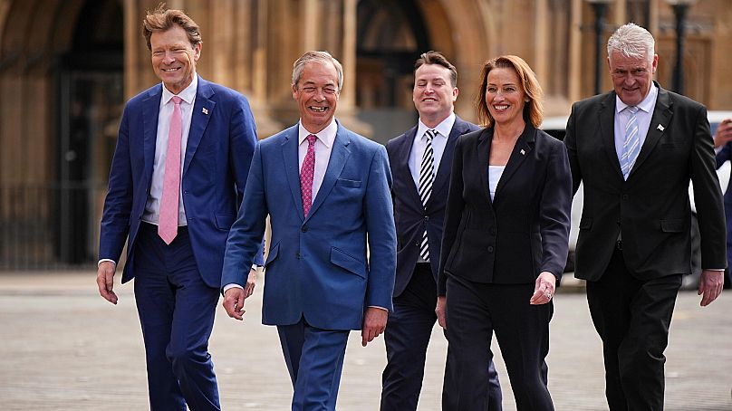 Sarah Pochin, the newly elected MP for Runcorn and Helsby, is joined by her fellow Reform UK MPs outside the Houses of Parliament on 6 May, 2025.
