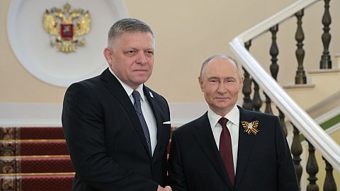 Prime Minister of Slovakia Robert Fico and Russian President Vladimir Putin shake hands during their meeting before Victory Day parades in Moscow, Russia, Friday, May 9, 2025