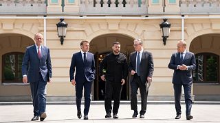 Four European leaders and Ukrainian President Volodymyr Zelenskyy walk at the Presidential Palace in Kyiv, 10 May 2025