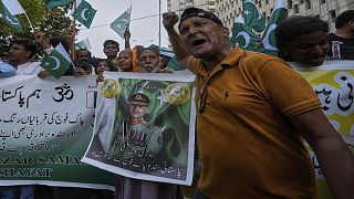 Members of Pakistani Hindu community take part in a demonstration to condemn Indian strikes into Pakistan and to show their support with the Pakistan Army, in Karachi.