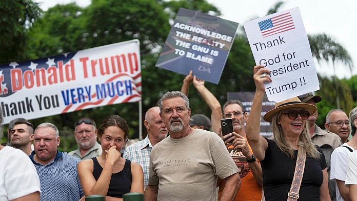 First group of white South Africans arrive in US after being granted refugee status