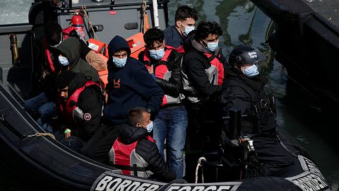 People thought to be migrants who undertook the crossing from France in small boats and were picked up in the Channel arrive in Dover, 17 June, 2022 