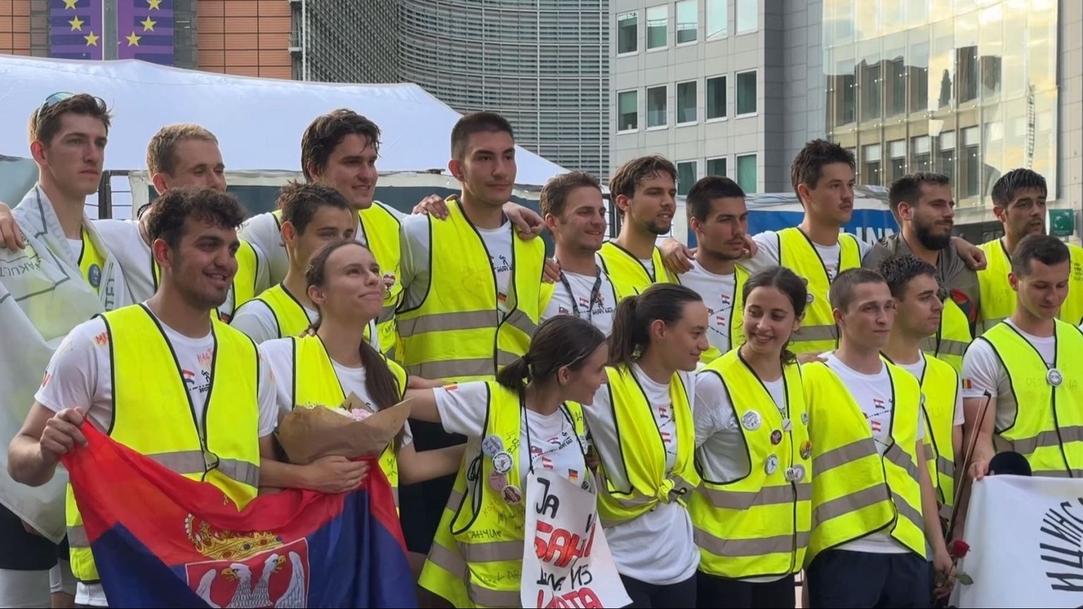 Students participating in the ultramarathon relay from Novi Sad, Serbia, arrive at their final destination, Brussels, Monday, May 12, 2025