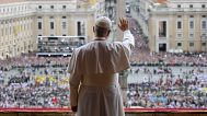 Pope Leo XIV waives from the central balcony of St. Peter's Basilica in the Vatican City, 11 May 2025