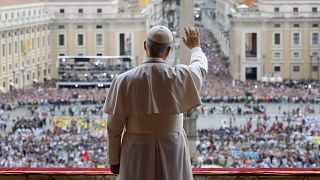 Pope Leo XIV waives from the central balcony of St. Peter's Basilica in the Vatican City, 11 May 2025