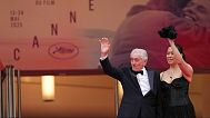 Robert De Niro and Tiffany Chen pose for photographers during the opening ceremony red carpet of the 78th international film festival, Cannes, France, Tuesday, May 13, 2025