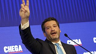 André Ventura, leader of the right-wing populist Chega party, addresses his supporters after the results of the Portuguese legislative elections were announced in Lisbon
