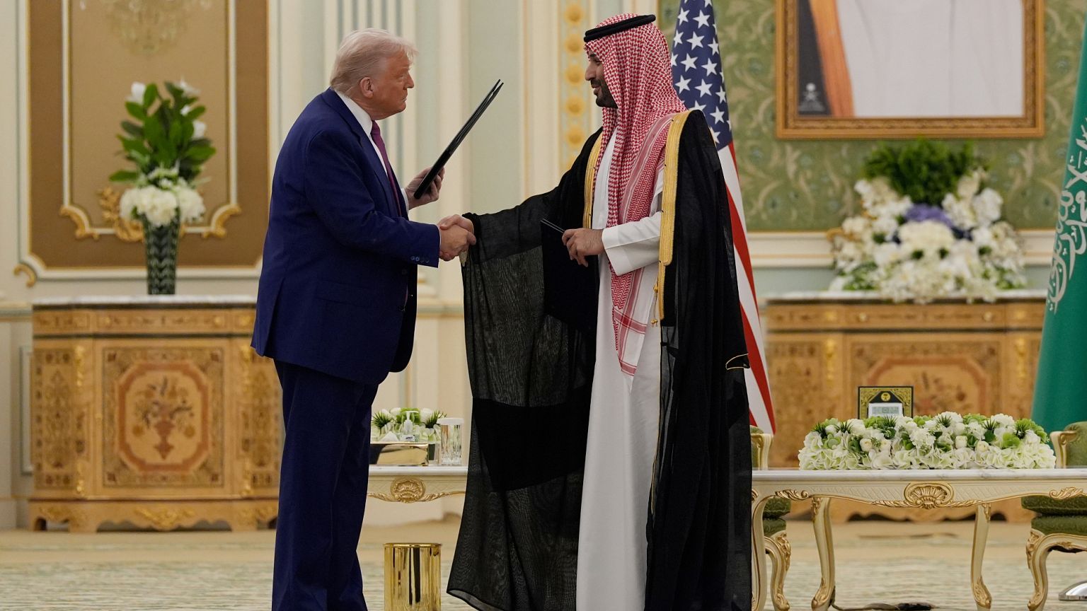 President Donald Trump and Saudi Crown Prince Mohammed bin Salman shake hands after exchanging documents during a signing ceremony at the Royal Palace in Riyadh, Saudi Arabia.