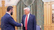 Syria's interim President Ahmad al-Sharaa shakes hands with US President Donald Trump in Riyadh.