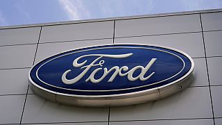 The Ford logo is seen above the entrance to the Ford Motor Company Kentucky Truck Plant, Wednesday, April 30, 2025, in Louisville, Ky