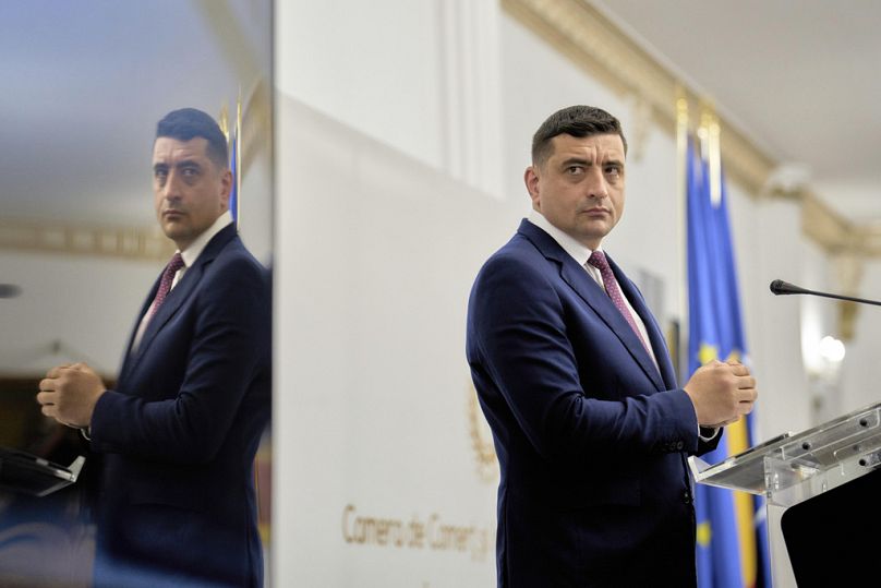 George Simion egy üzleti konferencia szónoklata közben
