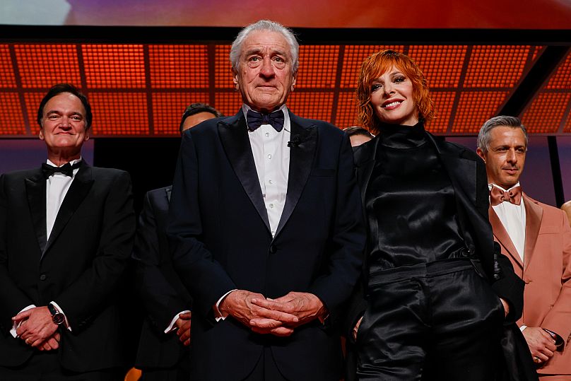 Mylène Farmer (right) next to honorary Palme d'Or winner Robert DeNiro