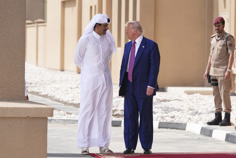 President Donald Trump and Qatar's Emir Sheikh Tamim bin Hamad Al Thani speak at Al Udeid Air Base, Thursday, May 15, 2025, in Doha, Qatar