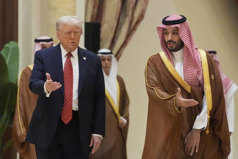 President Donald Trump arrives with Saudi Crown Prince Mohammed bin Salman for the group photo with GCC leaders during the summit in Riyadh, Saudi Arabia, Wed, May 14, 2025