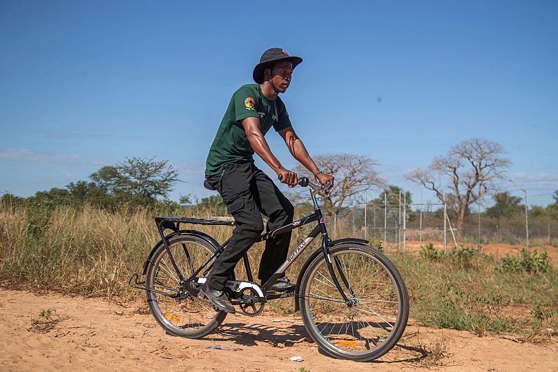Capon Sibanda, a local volunteer trained to be a community guardian for encounters between people and elephants.