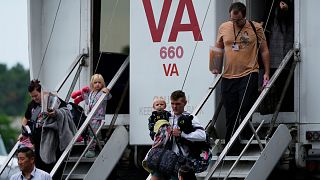 Afrikaner refugees from South Africa, arrive at Dulles International Airport in Dulles, VA, 12 May 2025