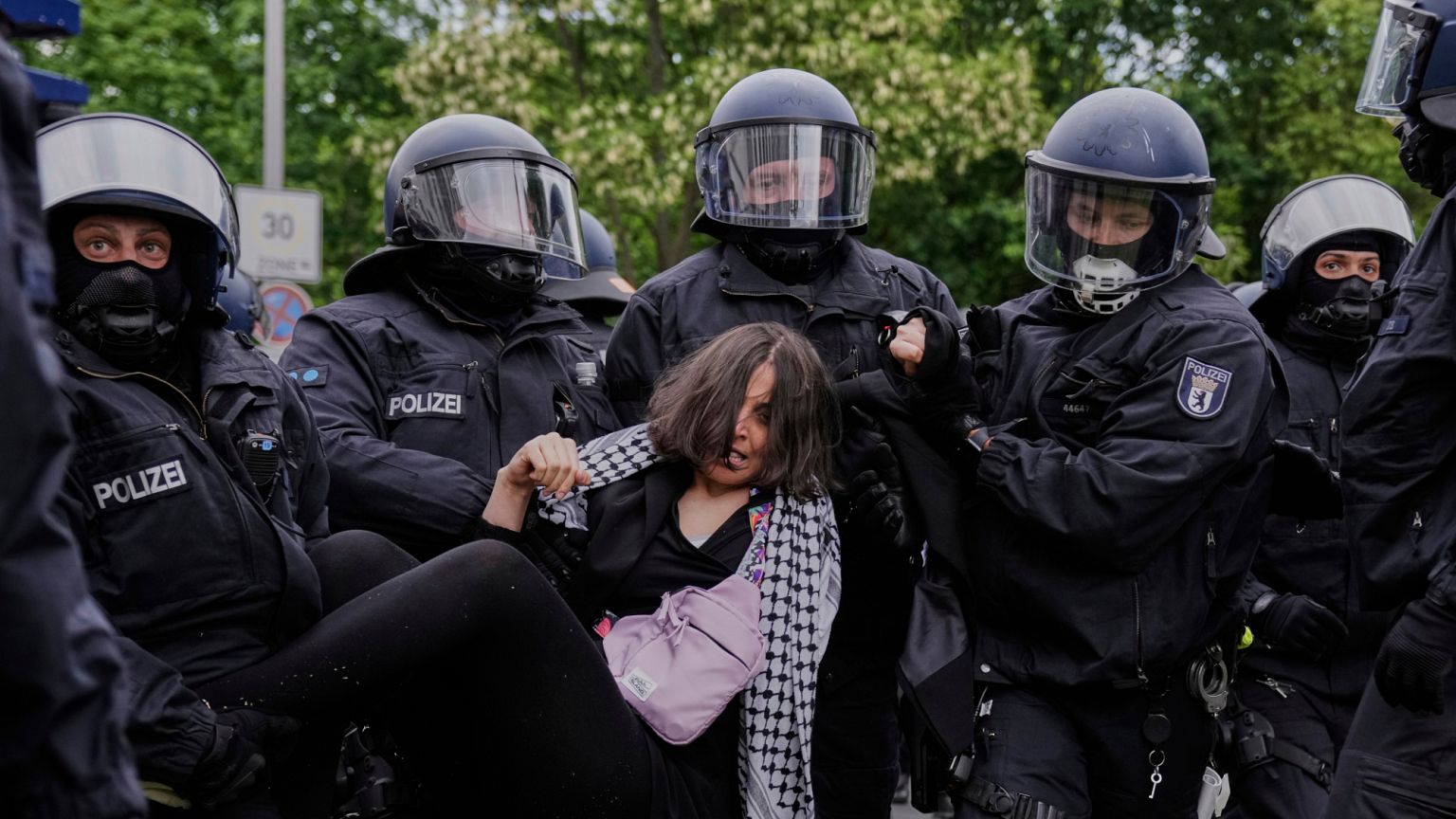 Police officers arrest a pro-Palestinians during a demonstration to commemorate the Nakba Day in Berlin, Germany, Thursday, May 15, 2025. 