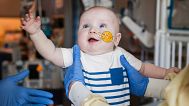 This photo provided by the Children's Hospital of Philadelphia shows KJ Muldoon after a follow up dose of an experimental gene editing treatment at the hospital in April 2025.