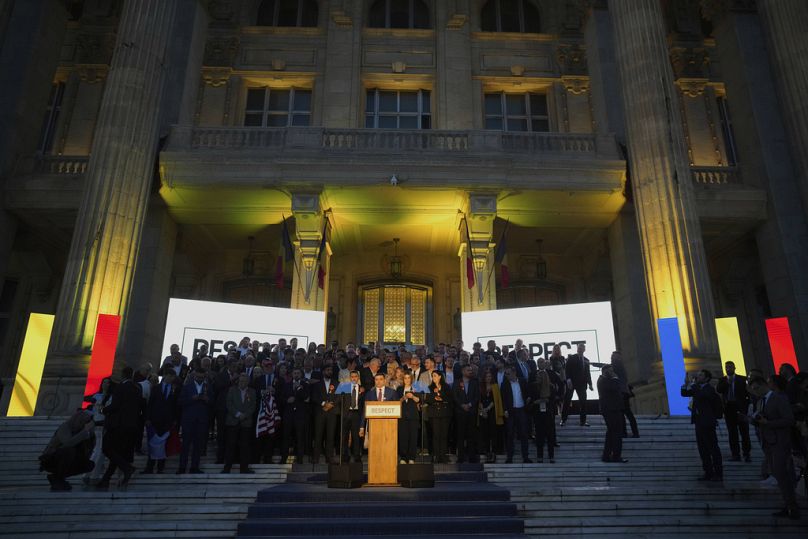 Presidential candidate George Simion speaks to media after polls closed for the second round of the country's presidential election redo in Bucharest, 18 May 2025