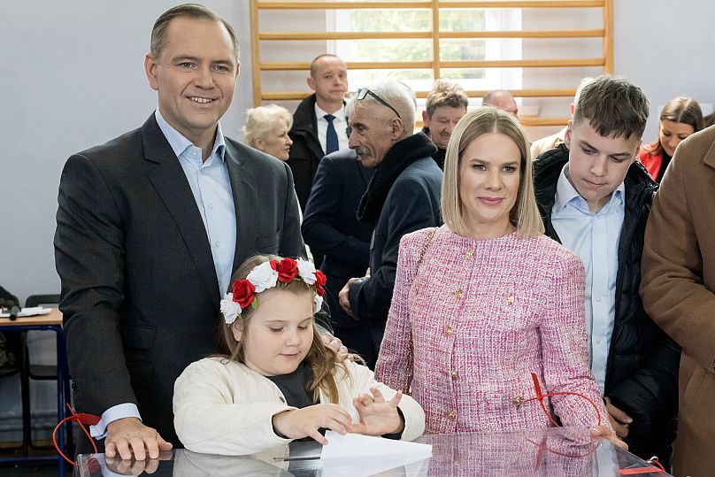 Karol Nawrocki, a PiS-backed independent candidate casting his vote with his family, in Gdansk, 18 May 2025