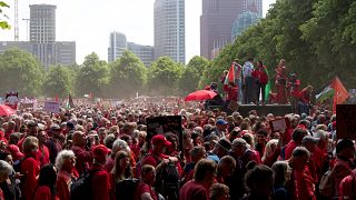 Demonstrators gather on the Malieveld for the Red Line protest in The Hague, Netherlands on Sunday, May 18, 2025.