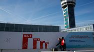 Passengers arrive at Orly airport, south of Paris.