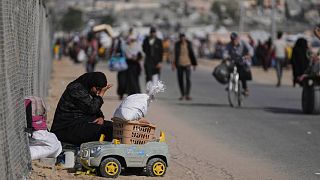 Displaced Palestinians flee from Khan Younis, Gaza, amid the ongoing Israeli military offensive in the area, on Monday, May 19, 2025. 