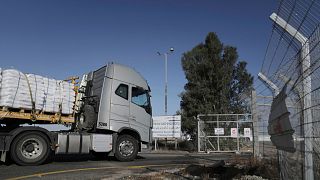 A truck carrying humanitarian aid for the Gaza Strip enters to Kerem Shalom Crossing in southern Israel, Tuesday May 20, 2025. 