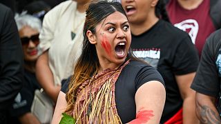 FILE PHOTO - Indigenous Māori react outside New Zealand's parliament to protest against a proposed law, in Wellington, New Zealand, Tuesday, Nov. 19, 2024. 