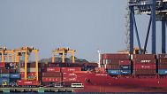 A container ship is docked at a cargo terminal in Tokyo, on April 9, 2025.