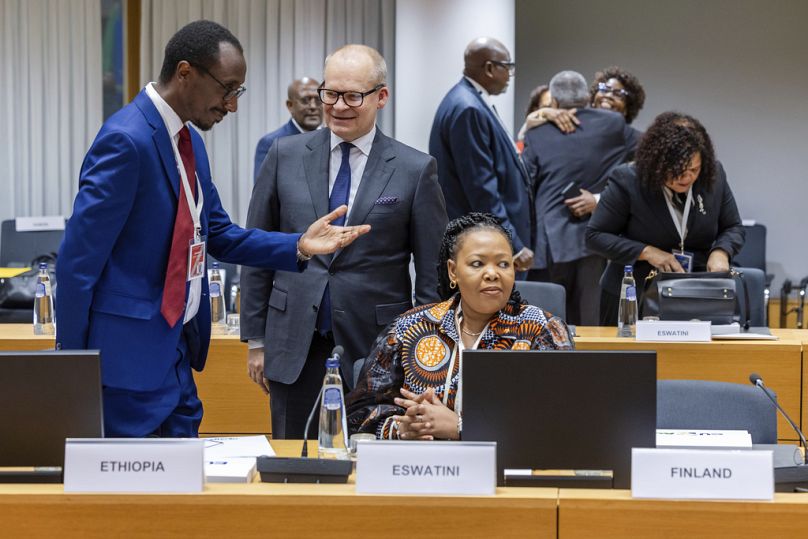 Pasi Rajala, Finland's State Secretary of Ministry of Defence and Ministry of Foreign Affairs, center, speaks to Ethiopia's Foreign Minister Gedion Timothewos, left, and Eswat