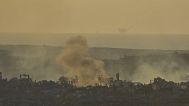 Smoke rises following an Israeli army bombardment in the Gaza Strip seen from southern Israel, 21 May, 2025