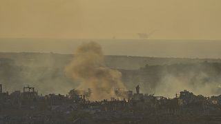 Smoke rises following an Israeli army bombardment in the Gaza Strip seen from southern Israel, 21 May, 2025