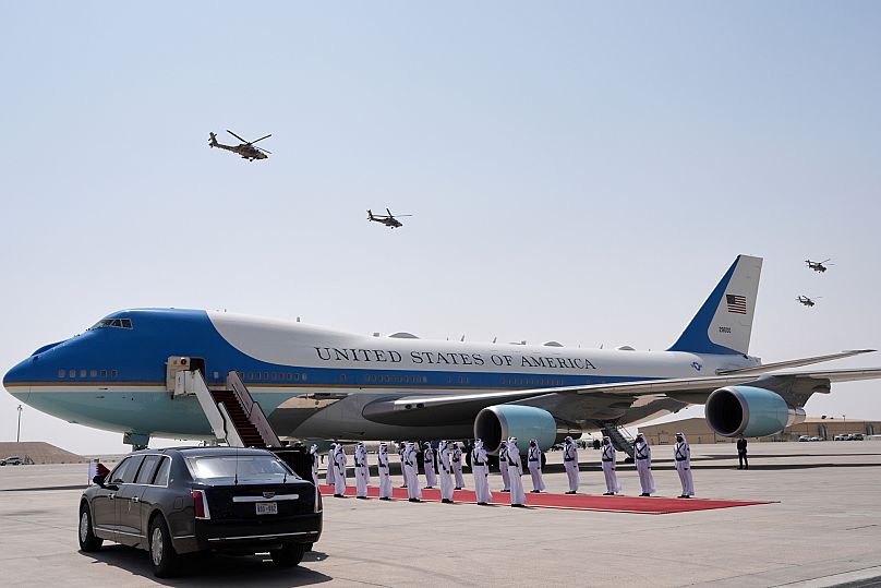 Qatar Air Force Apache gunships perform a flyover as Air Force One is ready to depart from Qatar, 15 May, 2025 