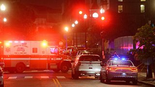 Law enforcement work the scene after two staff members of the Israeli Embassy in Washington were shot and killed outside the Capital Jewish Museum, 22 May 2025