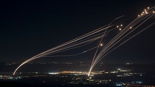 The Israeli Iron Dome air defense system fires to intercept an attack from Lebanon over the Galilee region as seen from the Israeli-annexed Golan Heights, on August 4, 2024.