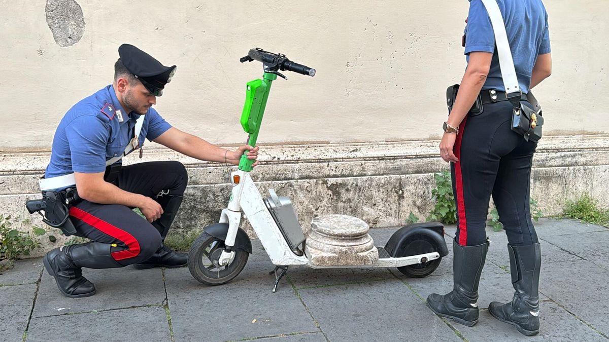 Rome police stop man carrying ancient marble slab on electric scooter