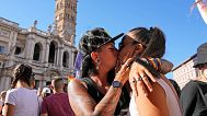 People take part in the annual Pride march in Rome, 26 June, 2021