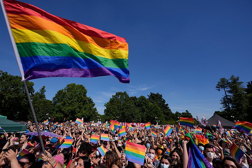 People take part in the annual Pride march in Rome, 26 June, 2021