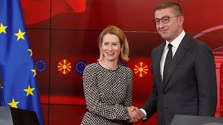 European Union foreign policy chief Kaja Kallas shakes hands with North Macedonia's Prime Minister Hristijan Mickoski in Skopje, 23 May 2025