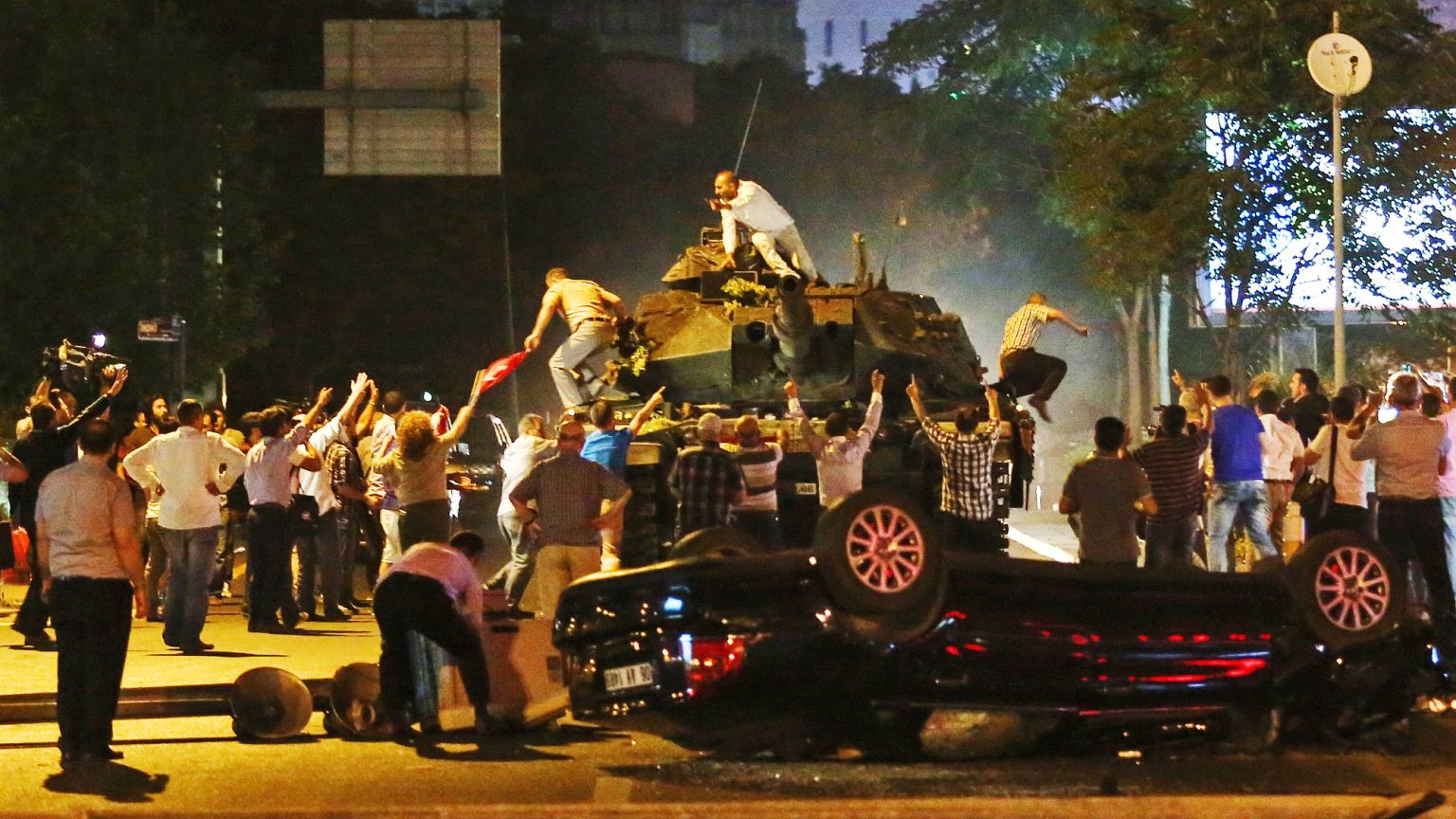 Tanks move into position as people attempt to stop them during the coup attempt in Ankara, 16 July, 2016 Tanks move into position as people attempt to stop them during the coup attempt in Ankara, 16 July, 2016