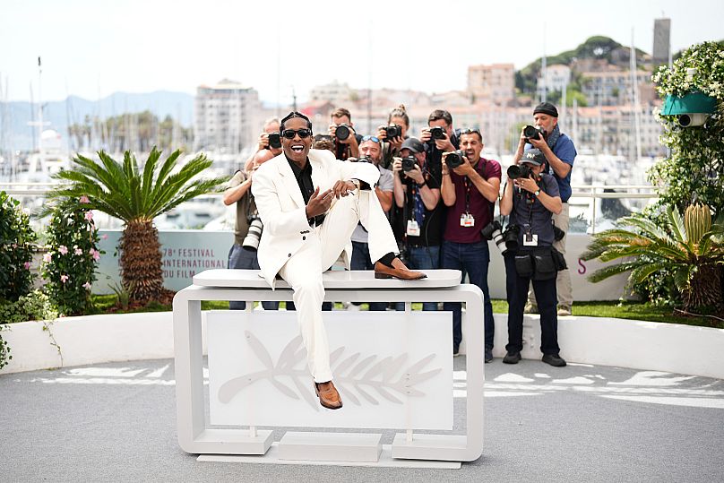 A$AP Rocky looked effortlessly cool in a crisp white Miu Miu suit at the Highest 2 Lowest photocall. 