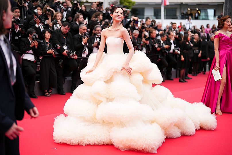 Actor Wan QianHui wowed in a voluminous Wang Feng FW25 couture gown at the Cannes opening.