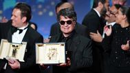 Iran's Palme d'Or-winning director Jafar Panahi cheered as he arrives home while French diplomat summoned over praise of Palme d'Or win