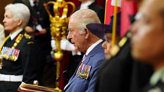 Canadian Prime Minister Mark Carney, left, and King Charles look on ahead of the King delivering the speech from the throne in the Senate in Ottawa on Tuesday, May 27, 2025.