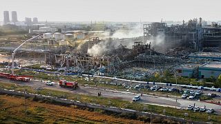Firefighters extinguish fires at the explosion site of a chemical plant in Gaomi in eastern China's Shandong province, 27 May, 2025