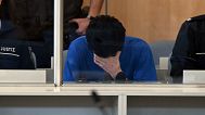 Issa Al H., accused of stabbing three people to death during a city festival, sits in the courtroom in Düsseldorf, 27 May, 2025
